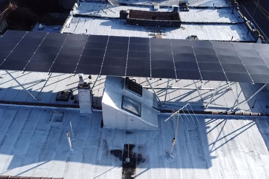 solar panels on roof built around hvac system new york