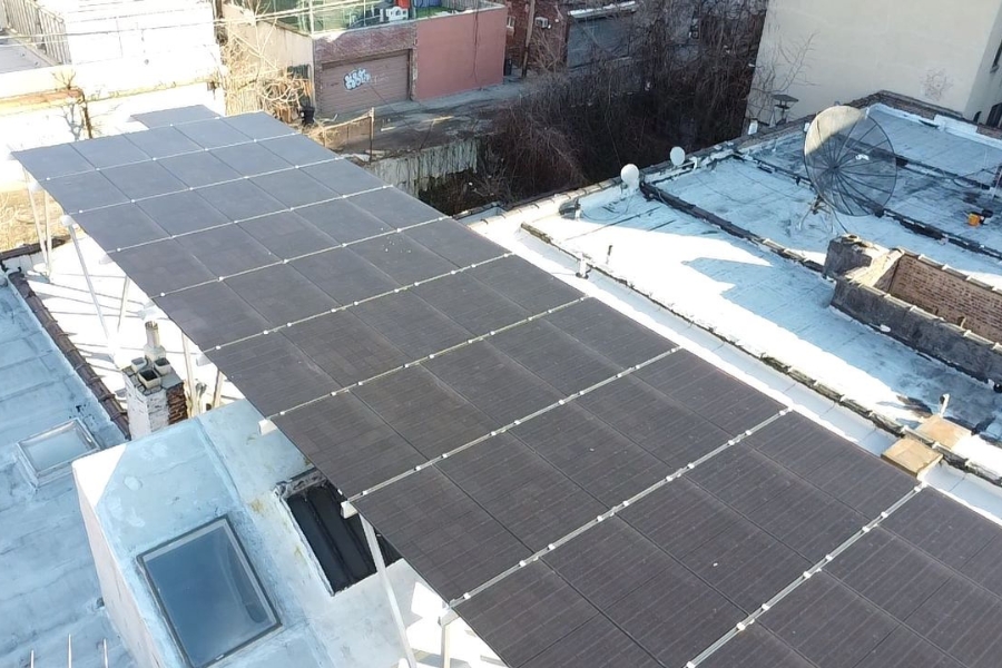 solar panels elevated on top of hvac system in new york