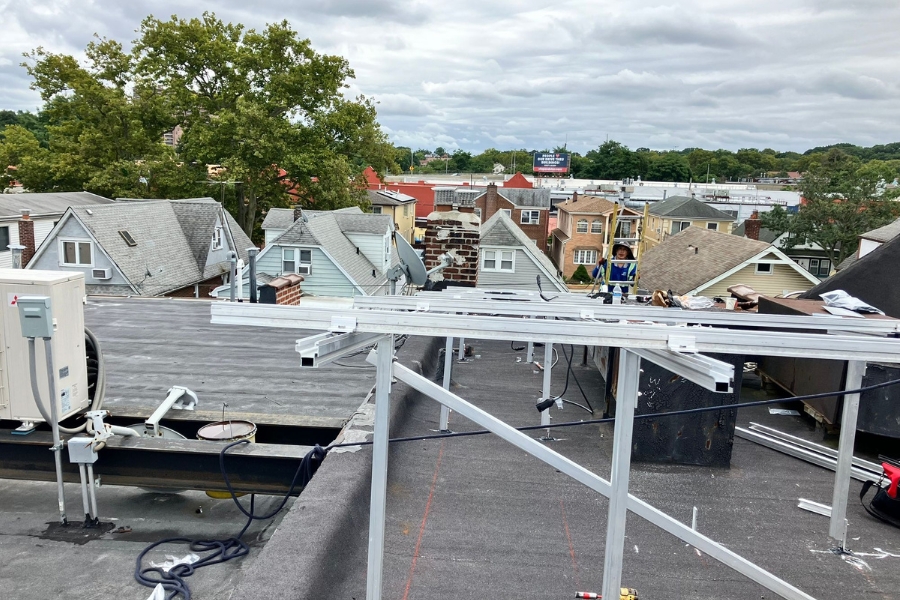solar panel installation on roof in neighbourhood