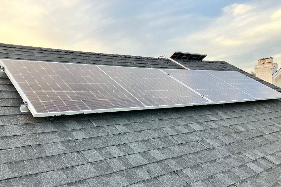solar pro main tiny home solar panel New York solar panels on a home's roof with sky